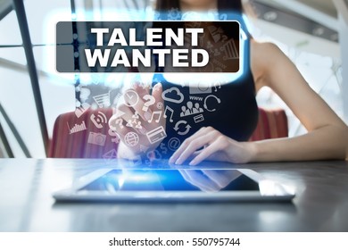 Woman Using Tablet Pc And Selecting Talent Wanted.