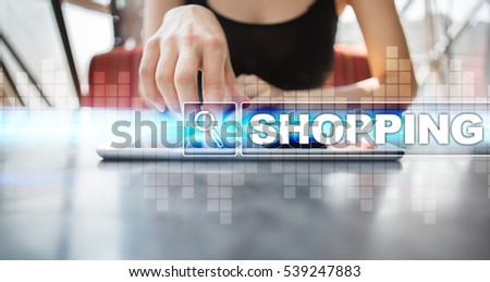 Woman using tablet pc and selecting shopping.