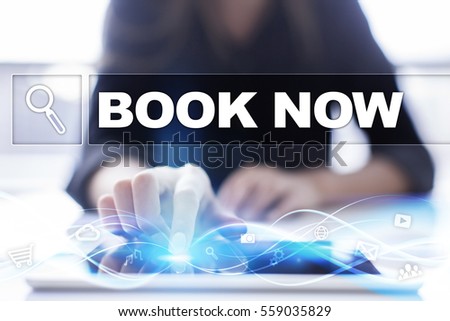 Woman using tablet pc and selecting book now.