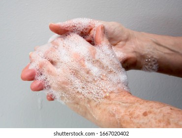 Woman Using An Thorough Handwashing Technique In Order To Avoid Contagion From Coronavirus And Bacteria.

