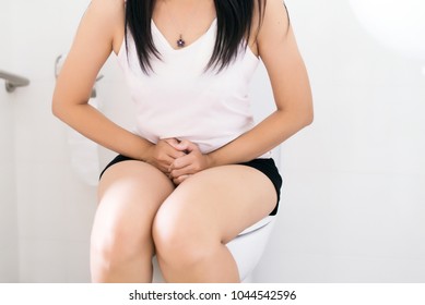 Woman using toilet after wake up at home in morning,excretory system,Need to pee,Cystitis symptom,leucorrhoea