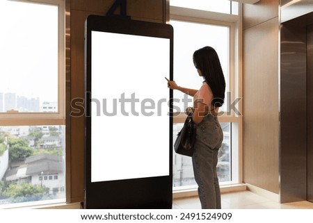 Similar – Image, Stock Photo Young woman walking past yellow building. Motion blur image. Person moving in the city.
