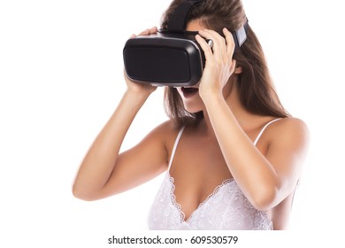 Woman Is Using VR Headset On White Background