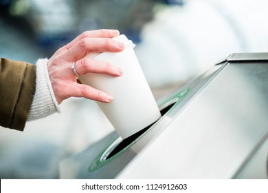 Woman Using Waste Separation Container Throwing Away Coffee Cup Made Of Styrofoam 