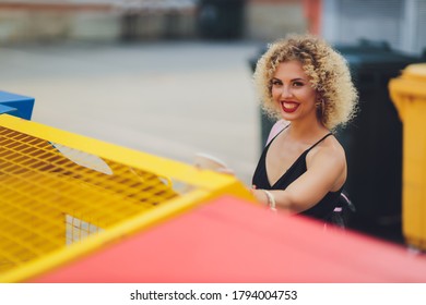 Woman Using Waste Separation Container Throwing Away Coffee Cup Made Of Styrofoam.