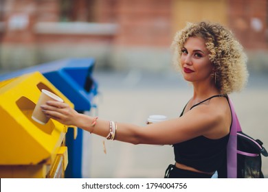 Woman Using Waste Separation Container Throwing Away Coffee Cup Made Of Styrofoam.