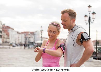 Woman Using Wearable Technology During Workout