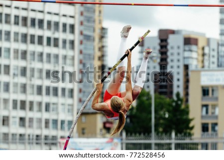 woman vaulter jump on competition in pole vault