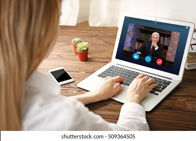 Woman Video Conferencing With Lawyer On Laptop. Video Call And Online Service Concept.