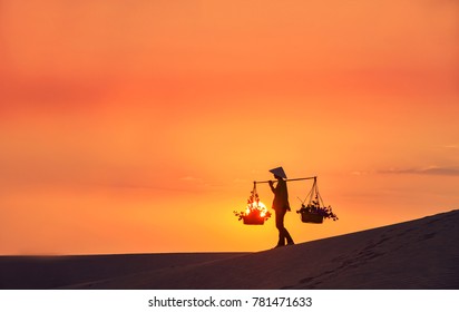 Woman With Vietnam Culture Traditional Dress On Sandune During Sunset ,traditional Costume ,Muine Vietnam