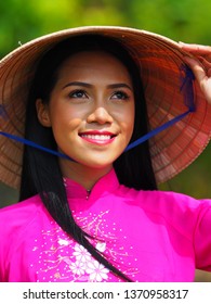 A Woman In Vietnamese Dress Perform As A Viet Cong People In 1960.