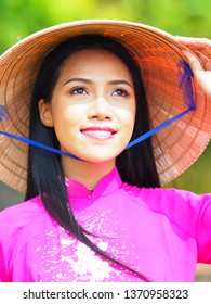 A Woman In Vietnamese Dress Perform As A Viet Cong People In 1960.