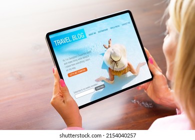 Woman viewing travel blog website on tablet computer