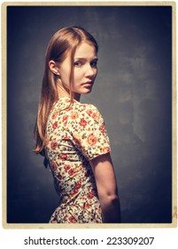 Woman Vintage Studio Portrait With Red Hair And  Dress With Flower