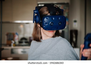 Woman in Virtual reality headset with abstract background. Virtual reality concept.