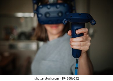 Woman in Virtual reality headset with abstract background. Virtual reality concept.