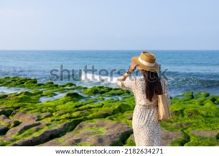 Woman visit Laomei Green Reef in Taiwan