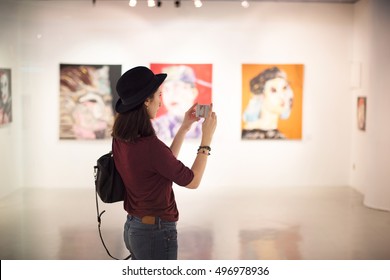 Woman Visiting Art Gallery Lifestyle Concept - Shutterstock ID 496978936