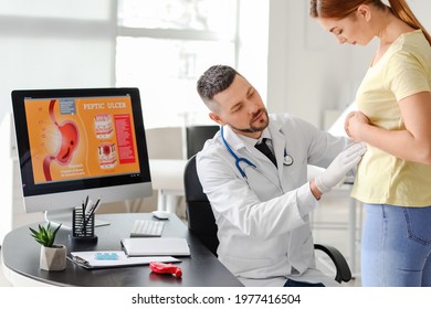 Woman Visiting Gastroenterologist In Clinic