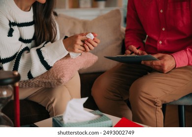 Woman visiting therapist counselor. Female on session of psychology help with depression, unhappy, exhausted, hopeless, mental disease, unwilling pregnancy, addiction to drugs, divorce, PTSD in war - Powered by Shutterstock