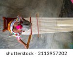 Woman waist weaving a beautiful traditional cotton fabric