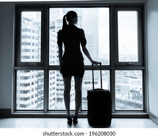 Woman waiting at the airport.