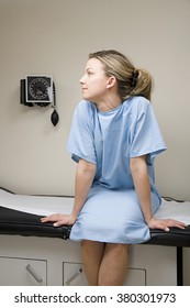 Woman Waiting On Treatment Couch