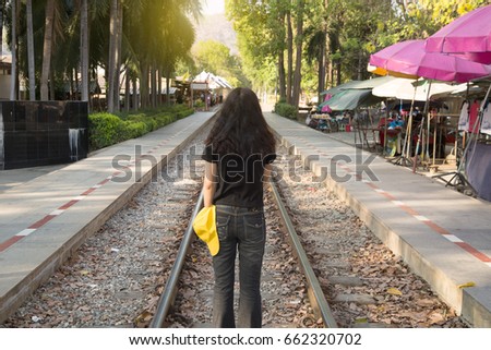 Woman waiting for the train.