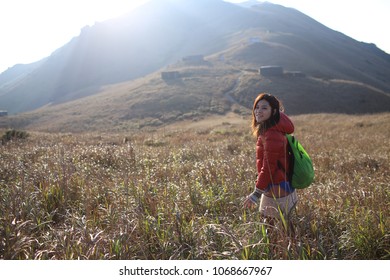 Woman Walk Thought The Sunset Peak