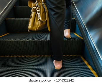 Woman Walk Upstairs On Escalator Stock Photo 1346322242 | Shutterstock