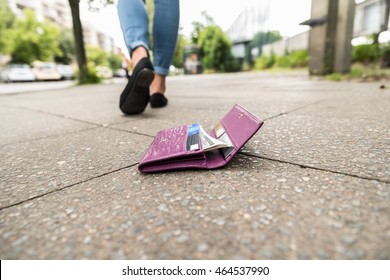 Woman Walking After Losing His Wallet On Street