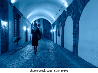 Woman Walking Alone At Night