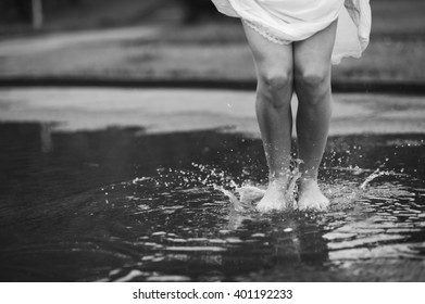 Woman Walking Barefoot Through Puddle Outdoors Stock Photo (Edit Now ...