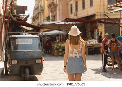 Woman Walking In The Food Market Of Palermo. Wanderlust