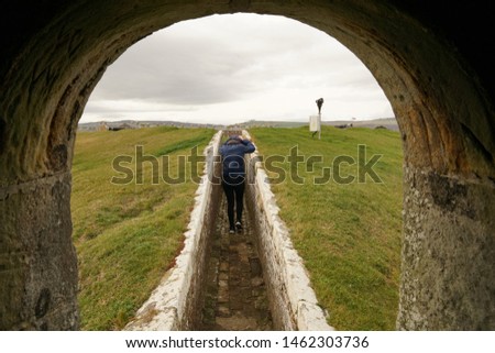 woman walking in Fort George scotland