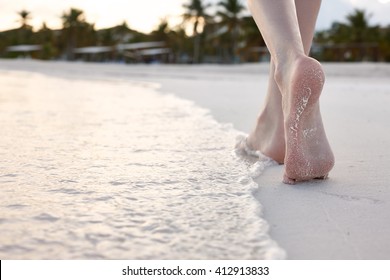 Woman walking on a beach