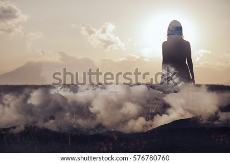Woman walking on clouds
