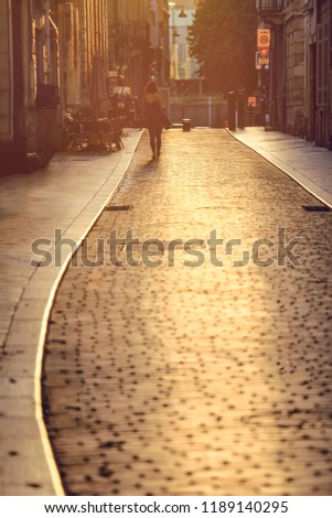 Similar – Auf einer einsamen Straße Richtung Sonnenuntergang