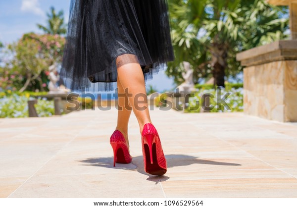 walking in very high heels