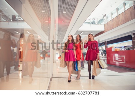 woman walking with shopping bags
