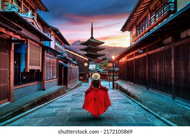 Woman walking at Yasaka Pagoda and Sannen Zaka Street in Kyoto, Japan.