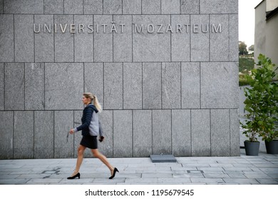 A Woman Walks Outside Of Mozarteum University In Salzburg, Austria On Sep. 20, 2018