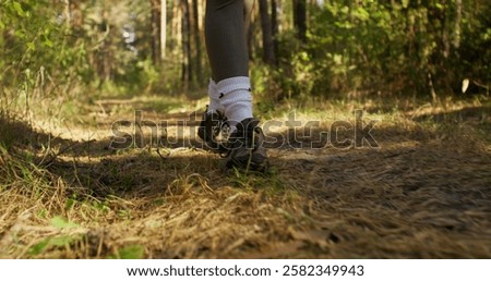 Similar – Image, Stock Photo Unrecognizable person in red fitness outfit doing exercise on the beach on a sunny day. Outdoor workout.