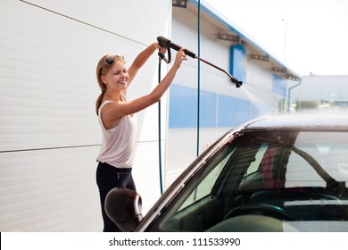 Woman Washing The Car