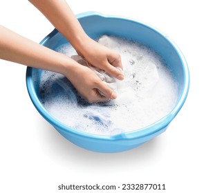 Woman washing clothes in plastic basin isolated on white background - Powered by Shutterstock