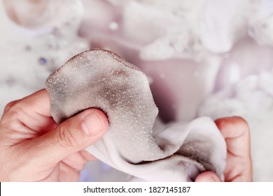 Woman Washing Dirty White Socks By Hand.