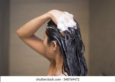 Woman Washing Hair With Shampoo, Healthcare