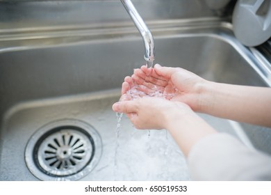 Woman Washing Hands