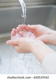 Woman Washing Hands