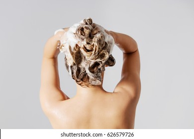 Woman Washing Her Blond Hair